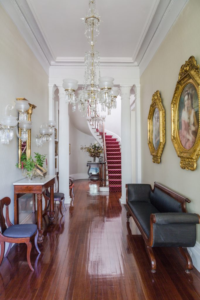 The entrance hall features chandeliers from circa 1850.