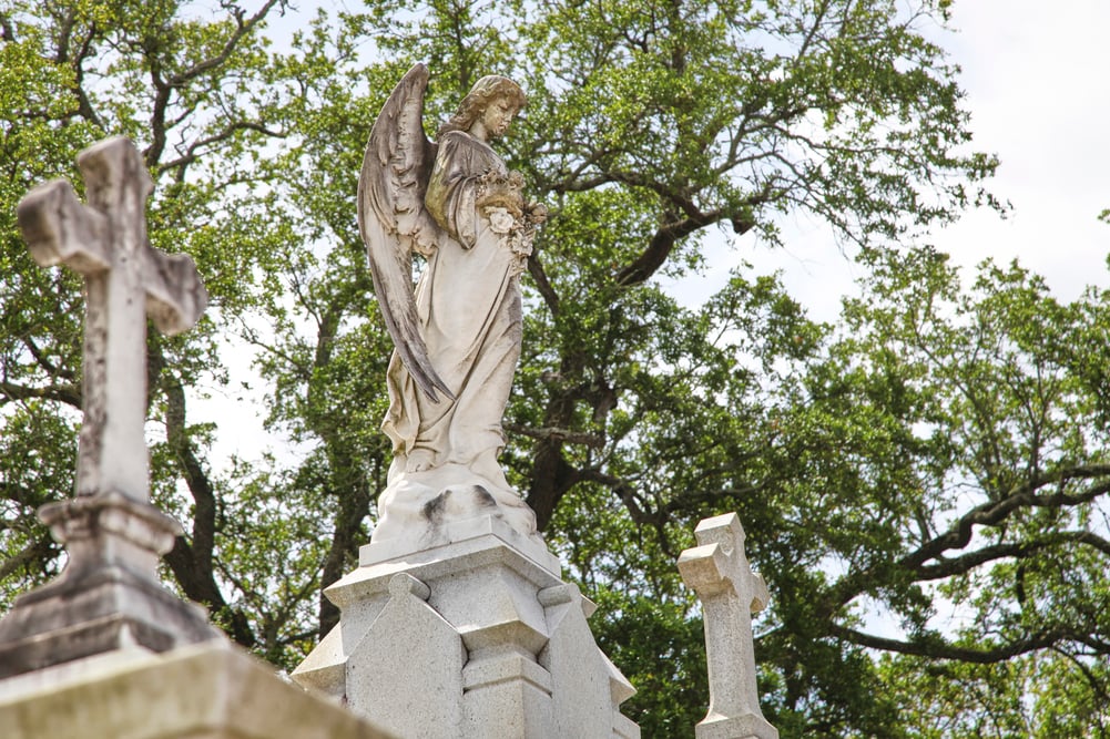 Angel statue on a gravesite at St. Louis Cemetery No. 3