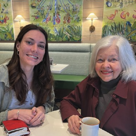 Intern Emily Morris and Patty Gay having coffee to discuss the work done during Emily's internship