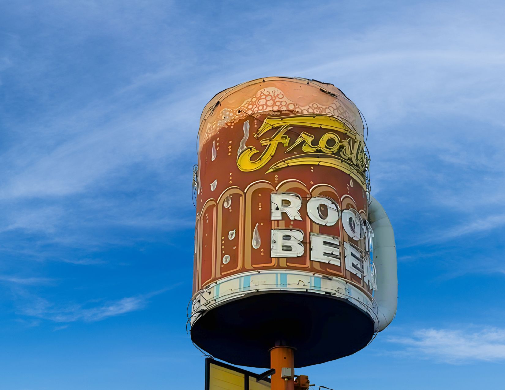 Iconic spinning Root Beer mug sign at Ted's Frostop on Calhoun
