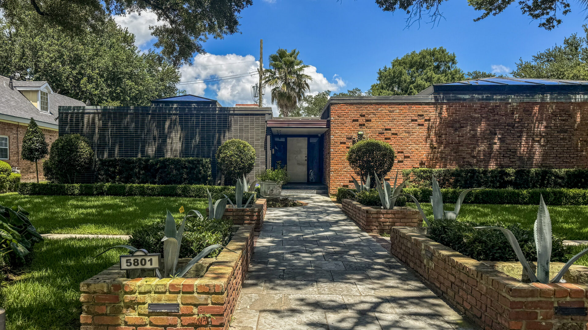 Home of Drayton & Leslie Holley 5802 Bellaire Drive featured on MidMod Home Tour