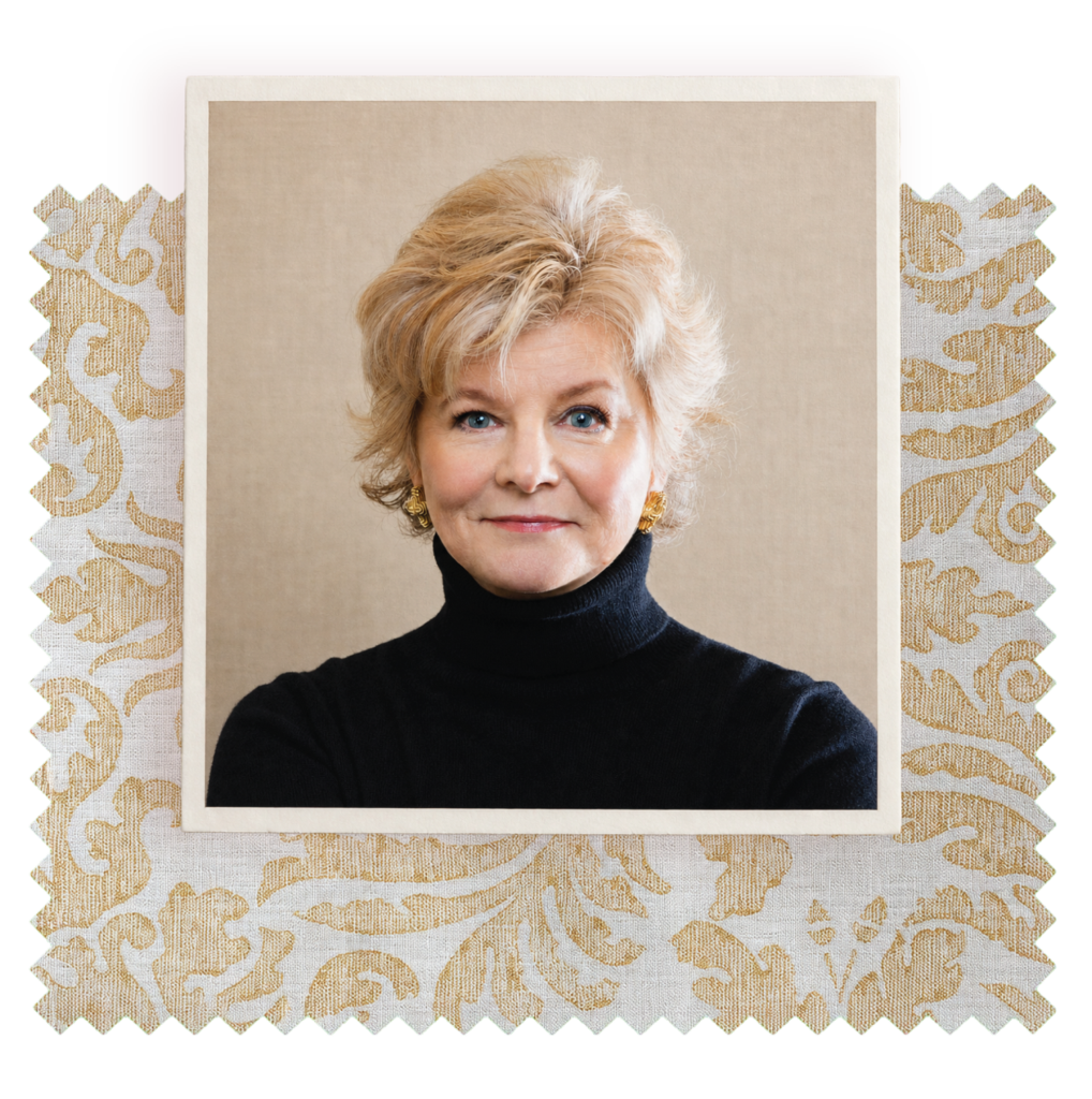 Portrait of Charlotte Moss, shown against a neutral background within a decorative cream-and-gold patterned frame.