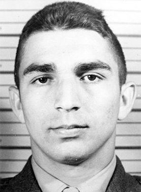 Black-and-white portrait of John August Abadie, a U.S. Marine Corps corporal who was killed during the Battle of Tarawa in 1943 at age 19.