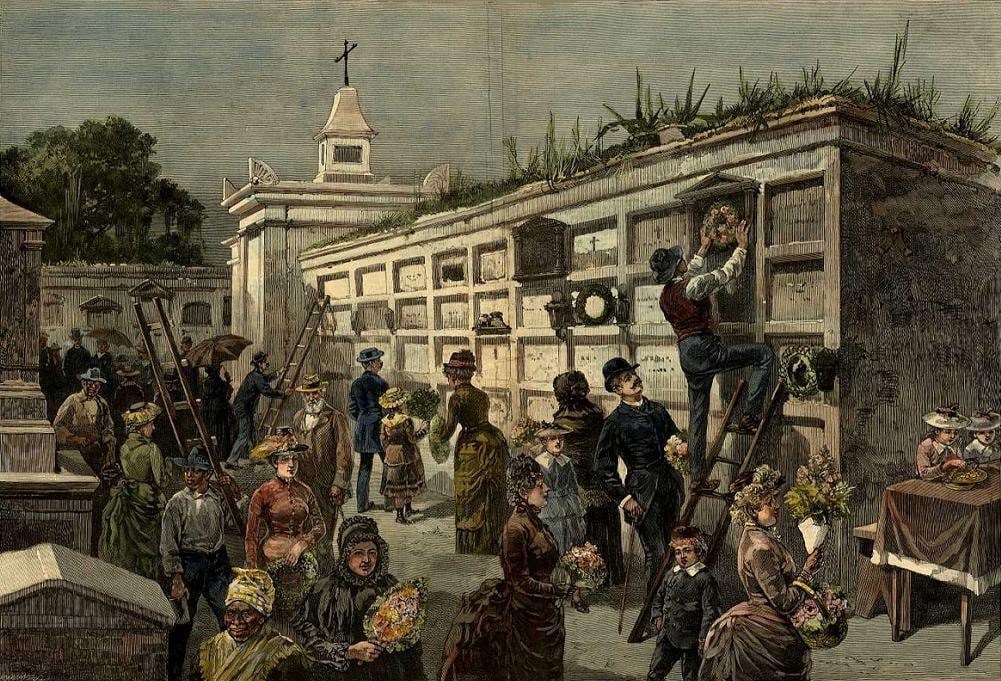 Historic illustration of All Saints’ Day in New Orleans showing people decorating above-ground cemetery tombs with flowers and wreaths. Visitors gather throughout the cemetery, with ladders leaning against the tombs as people clean and adorn the burial sites.