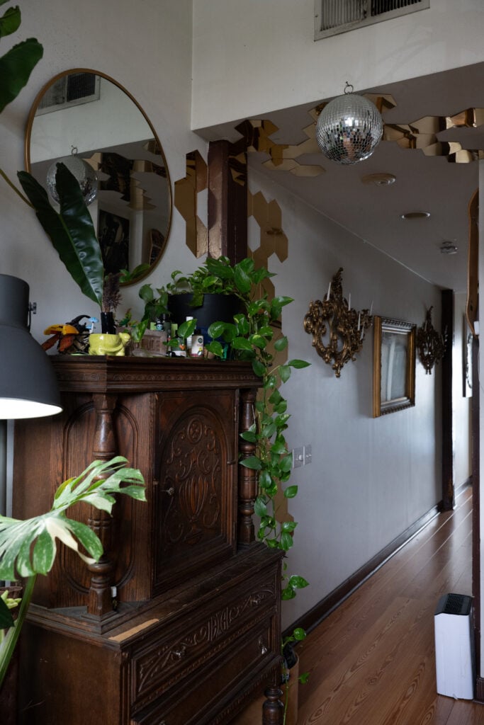 Interior hallway with an antique Toledo industrial scale displayed against a reclaimed wood wall