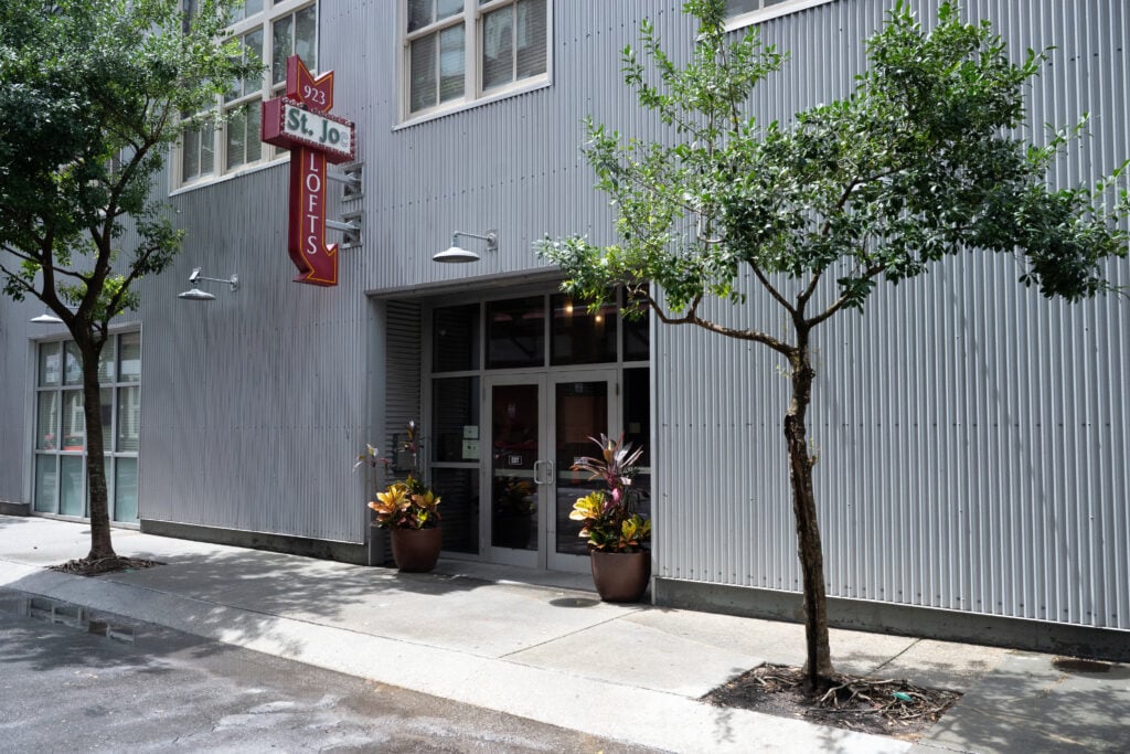 Exterior of St. Joe Lofts with the 923 St. Joe Lofts sign